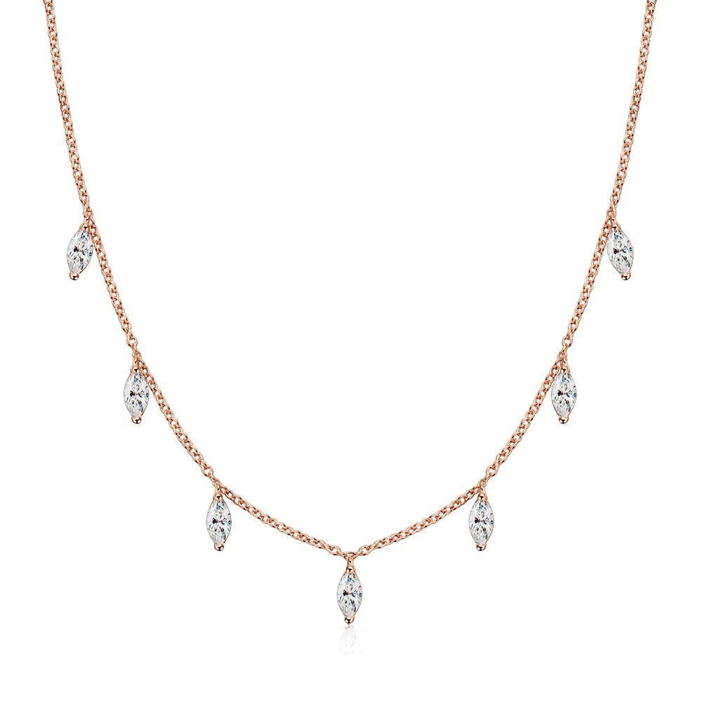 Bee-Bees rose gold sterling silver necklace with multiple marquise cut moissanite charms.