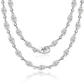 Bee-Bees Marquise moissanite tennis necklace in 925 silver with D color VVS1 stones and 18k gold plating.