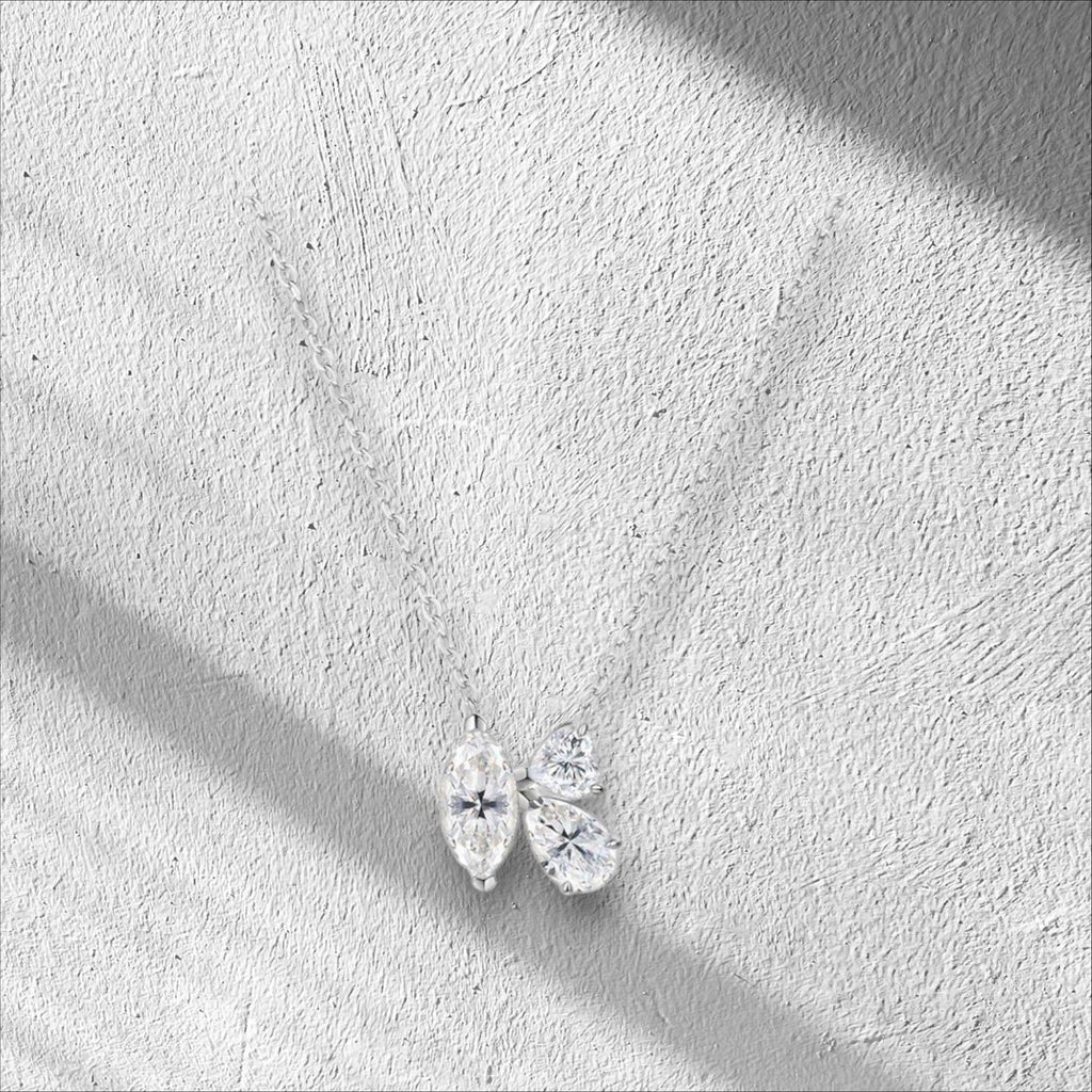 Bee-Bees 1.5ct marquise and pear cut moissanite pendant necklace in sterling silver with D color VVS1 clarity.
