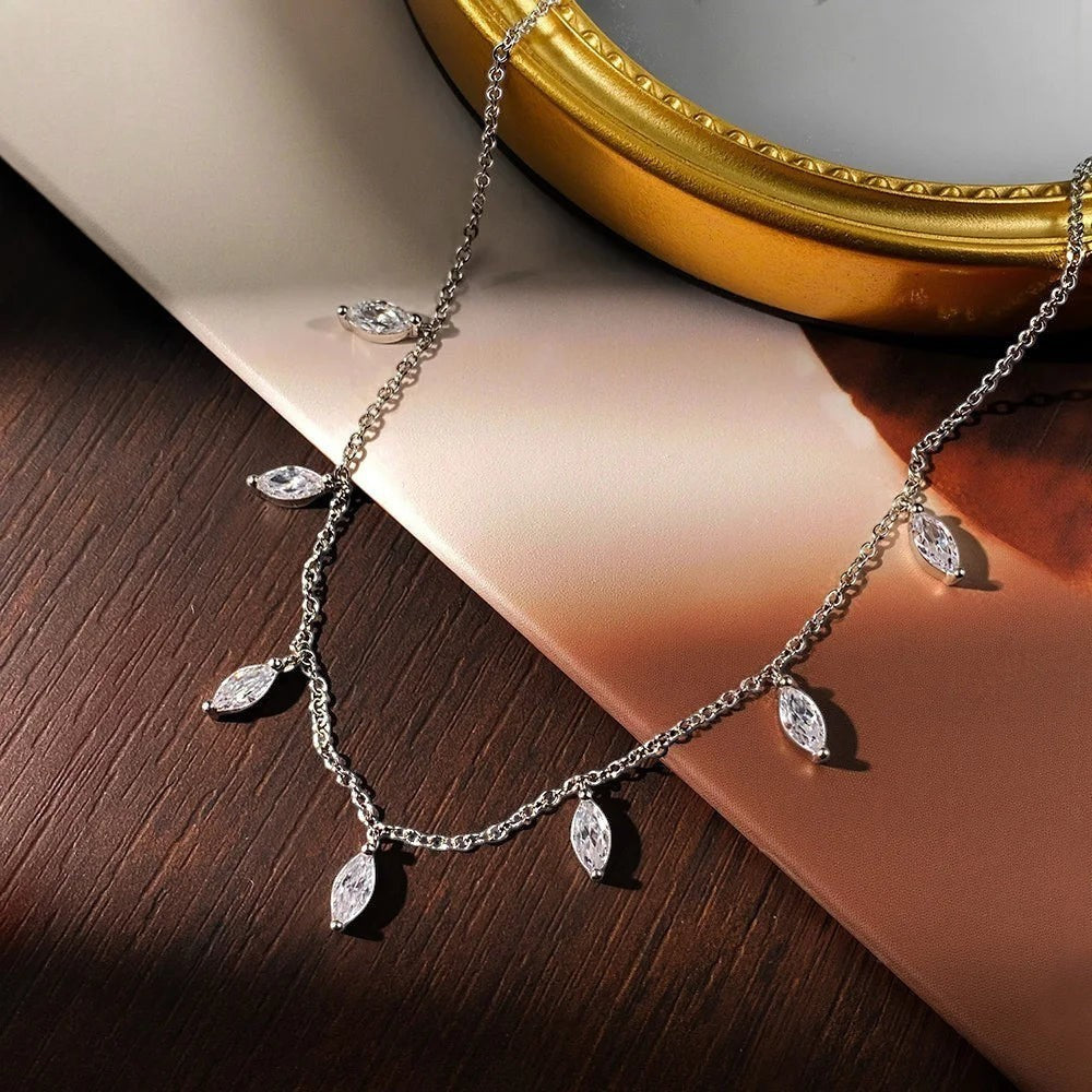Bee-Bees sterling silver necklace with multiple marquise-cut moissanite stones, D color, VVS1 clarity.