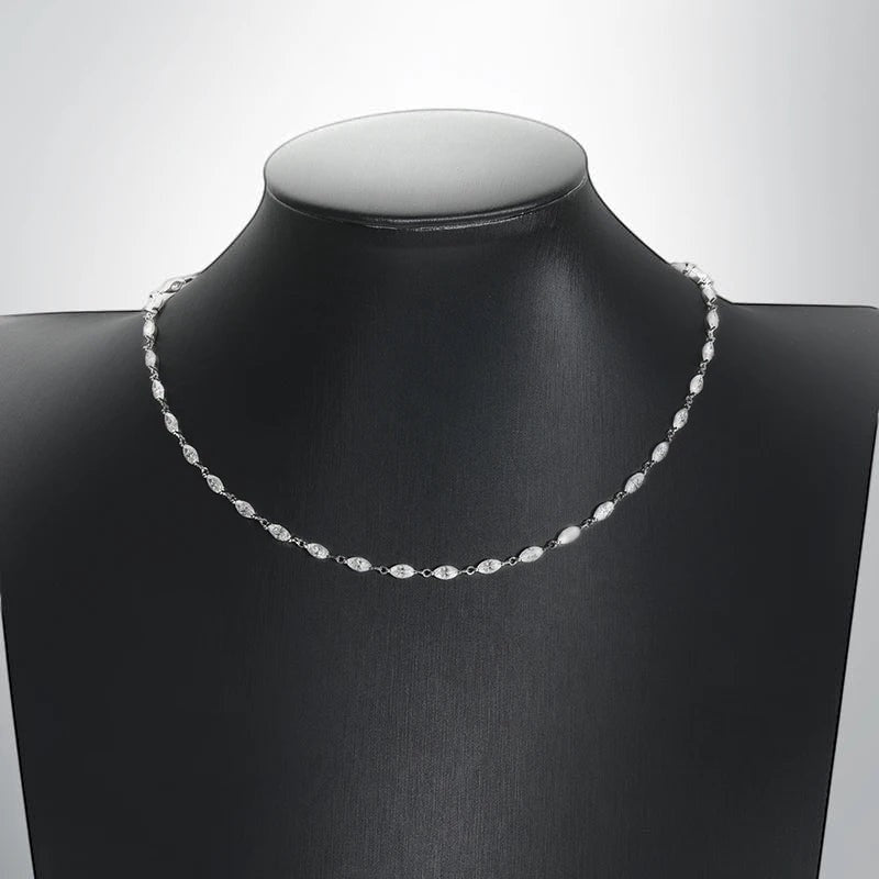 Bee-Bees Marquise moissanite tennis necklace with D color VVS1 clarity stones on 925 silver with 18k gold plating.