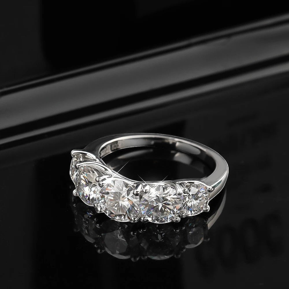 Bee-Bees 3.6ctw D Color Moissanite 5-Stone Band in sterling silver with 18k white gold plating. GRA Certified.