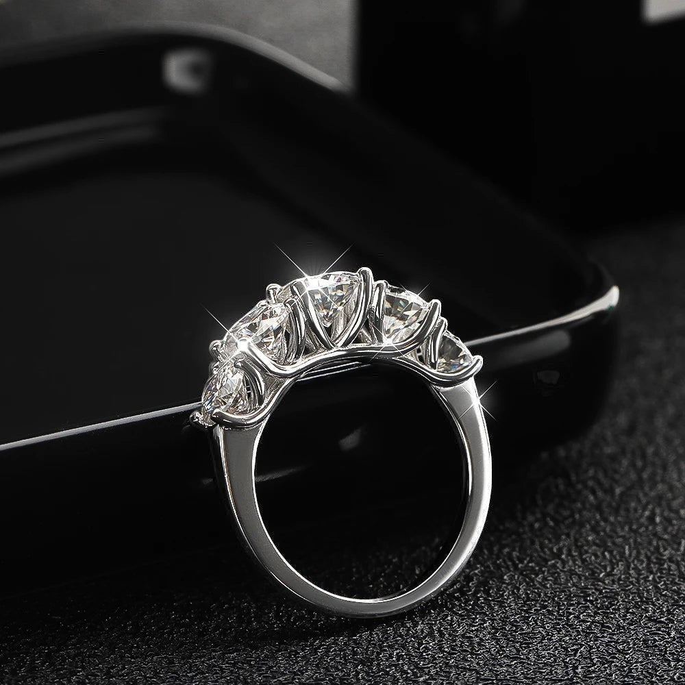 Bee-Bees 3.6ctw D Color Moissanite 5-Stone Band in sterling silver with 18k white gold plating. GRA Certified.