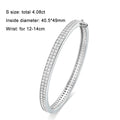 Bee-Bees sterling silver bangle with full row of 2mm D VVS1 moissanite stones, 18K gold plated, 6mm wide.