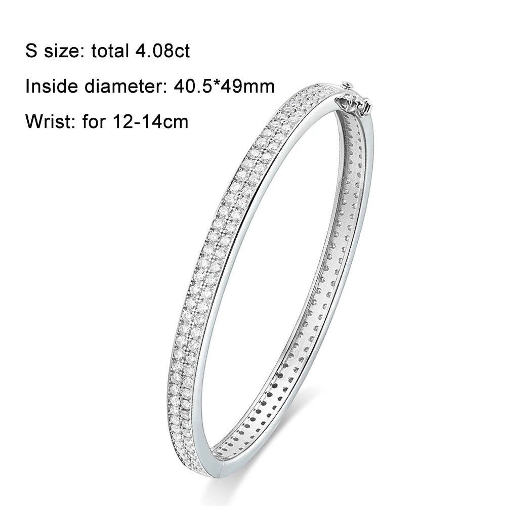 Bee-Bees sterling silver bangle with full row of 2mm D VVS1 moissanite stones, 18K gold plated, 6mm wide.