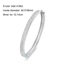 Bee-Bees sterling silver bangle with full row of 2mm D VVS1 moissanite stones, 18K gold plated, 6mm wide.
