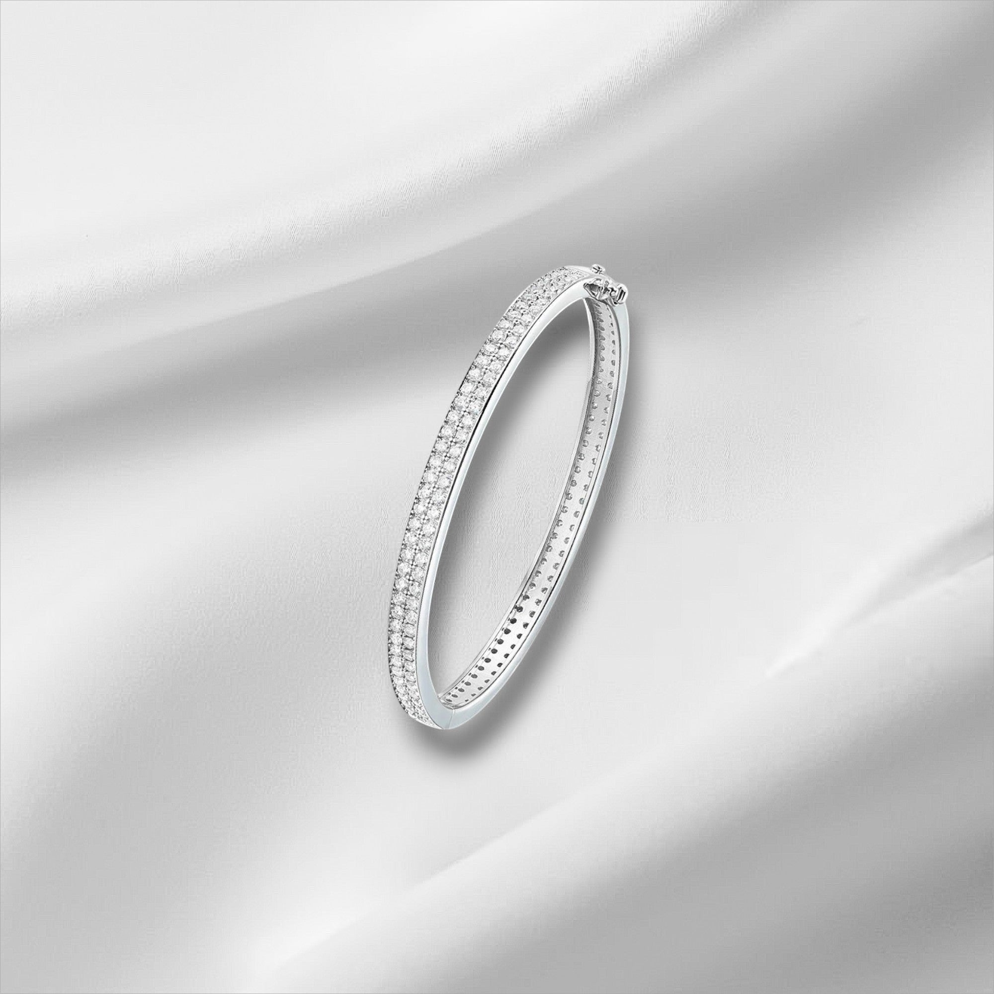 Bee-Bee's sterling silver bangle with 2mm D VVS1 moissanite stones, 18K gold plated, 6mm wide.