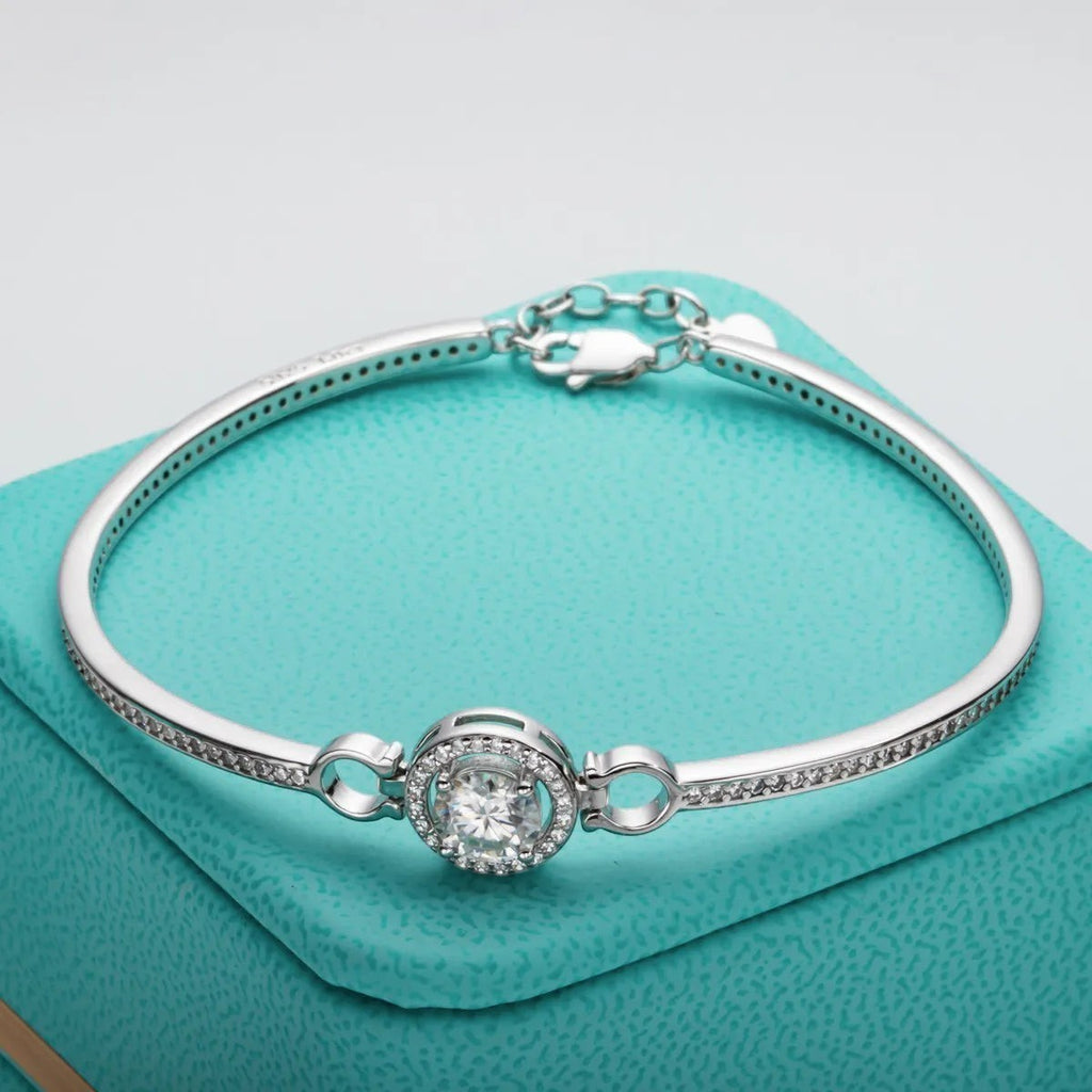 Bee-Bees 1ct Moissanite adjustable bangle in sterling silver with 18k white gold plating and D-color stone.