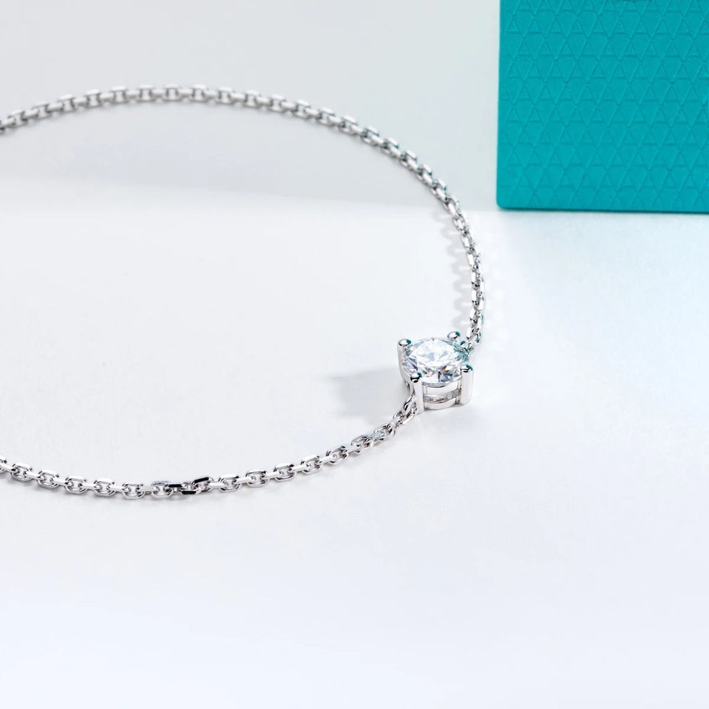 Bee-Bees 1ct round cut moissanite bracelet in s925 sterling silver with 18k gold plating. GRA certified.