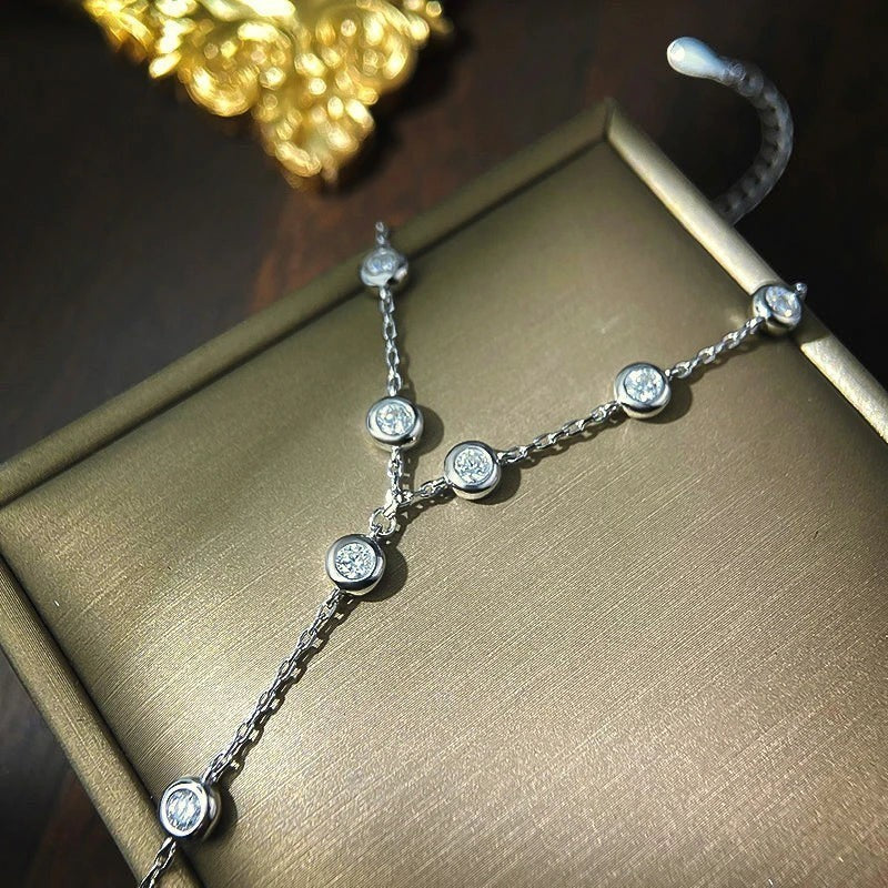 Bee-Bees 3mm moissanite bubble bracelet in 925 sterling silver with 18k gold plating and adjustable slider.