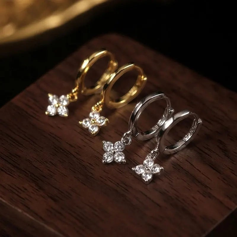 Bee-Bee's 3mm D Color Moissanite Clover Hoop Earrings in gold and silver, crafted from S925 Sterling Silver with 18k white gold plating.