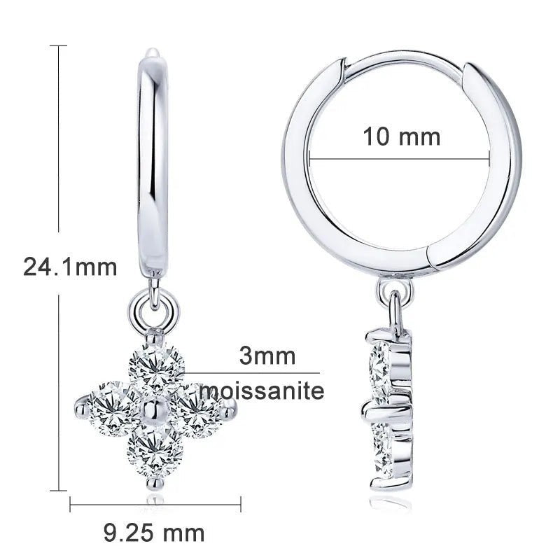 Bee-Bee's sterling silver hoop earrings with 3mm D-color moissanite clover charm. Elegant wedding jewelry.