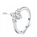 Bee-Bees sterling silver ring featuring a D-color moissanite four-leaf clover design with 2.5mm round-cut stones.