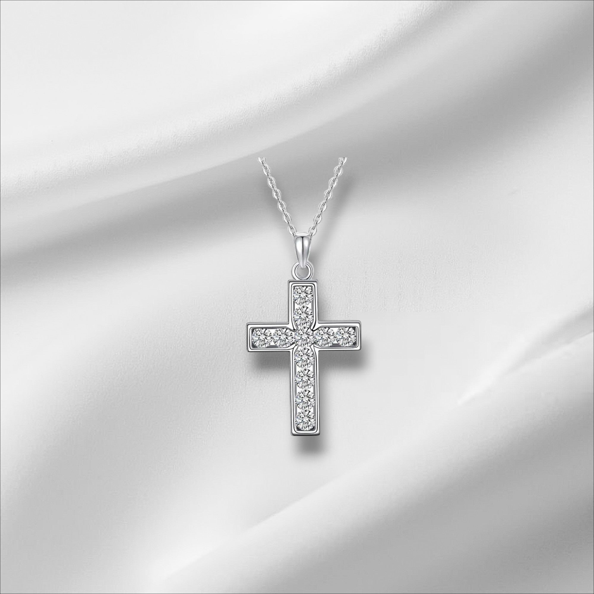 Bee-Bees 2.2ct Moissanite cross pendant necklace in 925 sterling silver with 18k white gold plating. Features 11 D Color VVS1 stones.