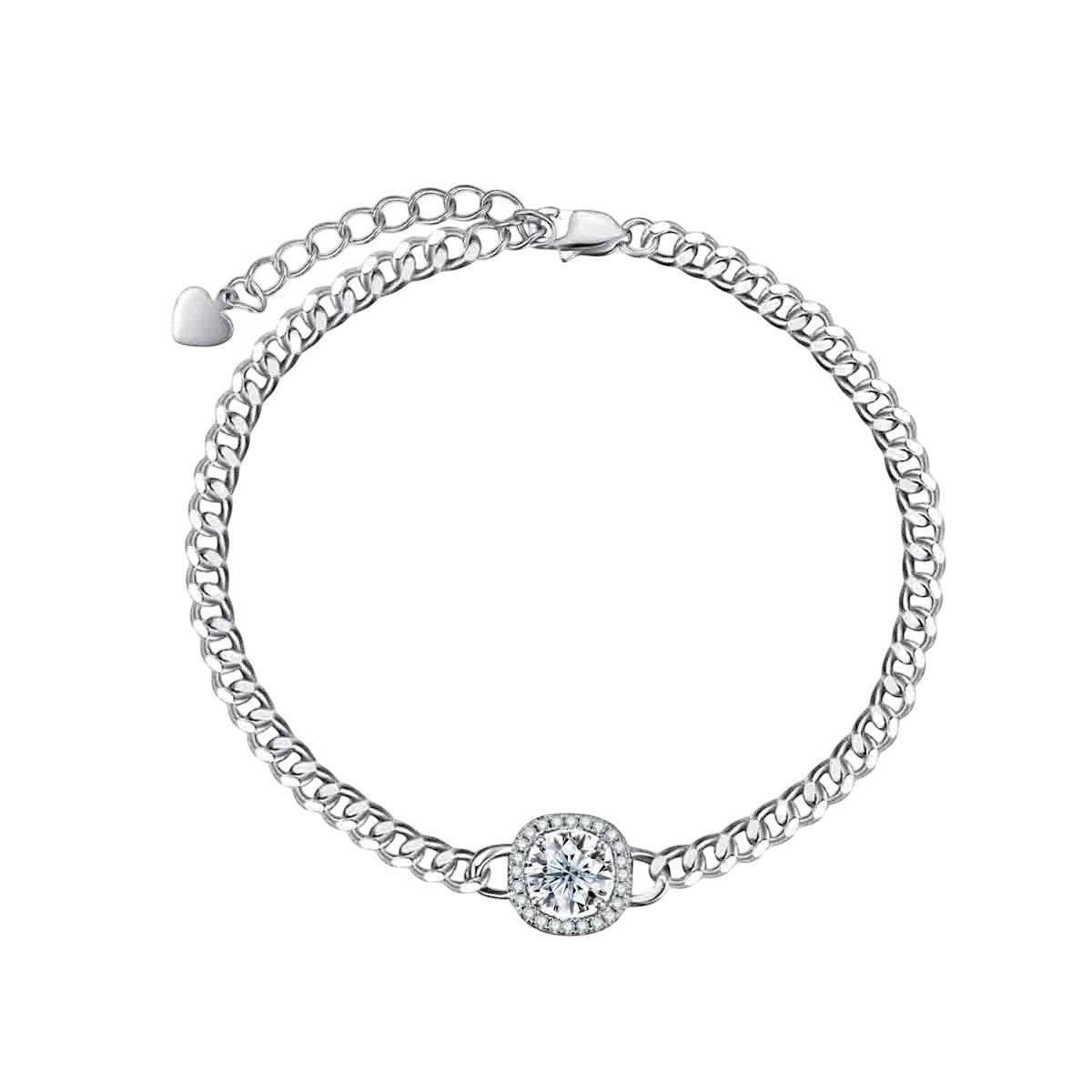 Bee-Bees Moissanite Cuban bracelet in sterling silver with 18k white gold plating and a central halo-set round brilliant cut moissanite.