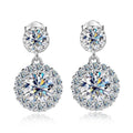 Bee-Bees 1ct round cut moissanite drop earrings in S925 silver with halo setting and GRA certification.