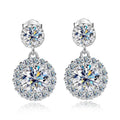 Bee-Bees 1ct round cut moissanite drop earrings in S925 silver with halo setting and GRA certification.