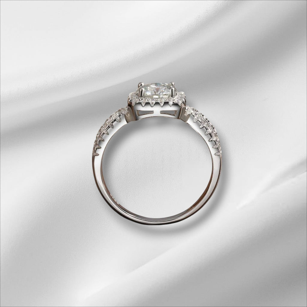 Bee-Bees 1ct D VVS1 Moissanite engagement ring in 18k white gold plated 925 silver with halo setting.