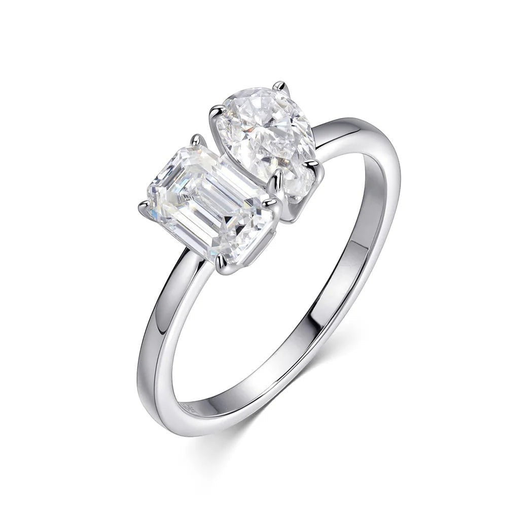 Bee-Bees two-stone engagement ring with emerald and pear-cut D VVS1 moissanite stones in S925 silver.