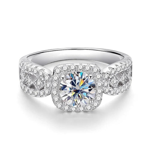Bee-Bees 1ct D VVS1 Moissanite engagement ring in 18k white gold plated 925 silver with halo and side stones.
