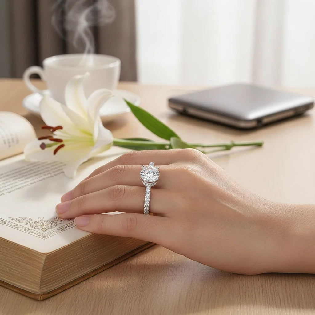 Bee-Bees 1.5ct Moissanite engagement ring in sterling silver with 18k gold plating. Round brilliant cut stone with pavé band.