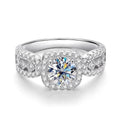 Bee-Bees 1ct D VVS1 Moissanite engagement ring in 18k white gold plated 925 silver with halo and side stones.