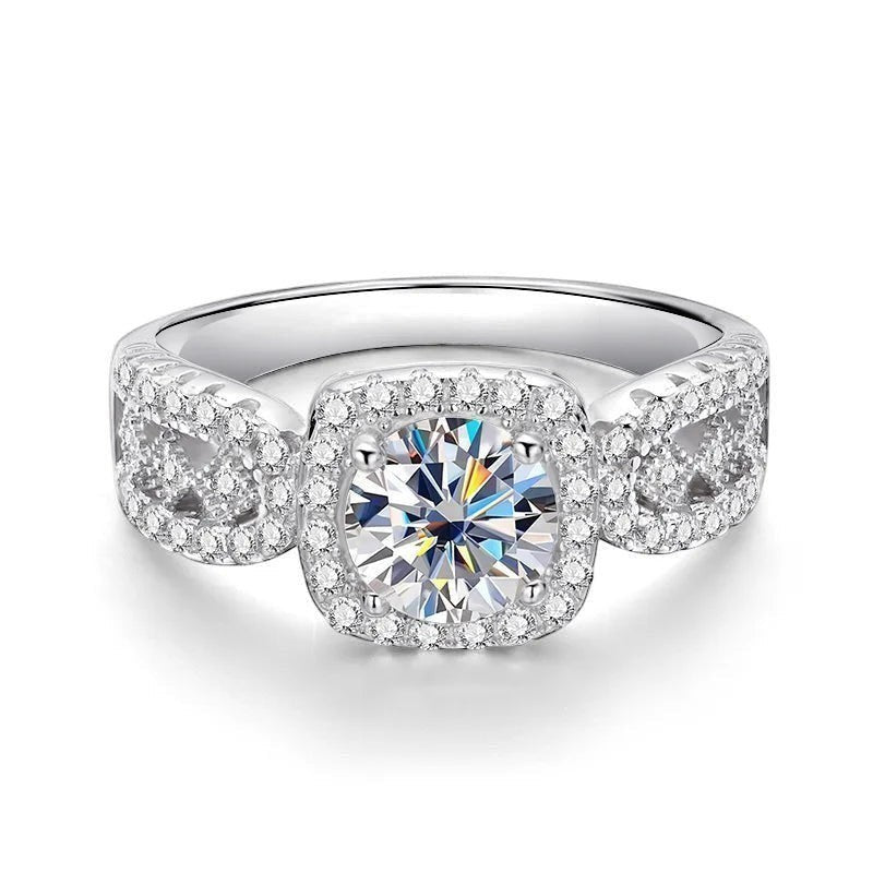 Bee-Bees 1ct D VVS1 Moissanite engagement ring in 18k white gold plated 925 silver with halo and side stones.