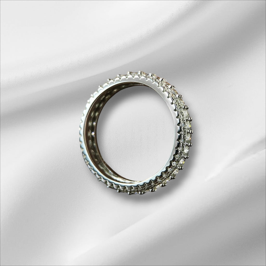 Bee-Bee's s925 Sterling Silver Moissanite Eternity Band Ring with 18k white gold plating and round-cut stones.