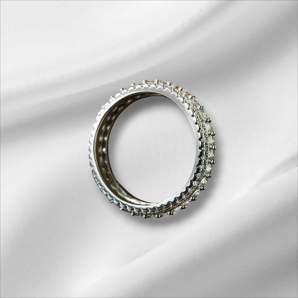 Bee-Bee's s925 Sterling Silver Moissanite Eternity Band Ring with 18k white gold plating and round-cut stones.