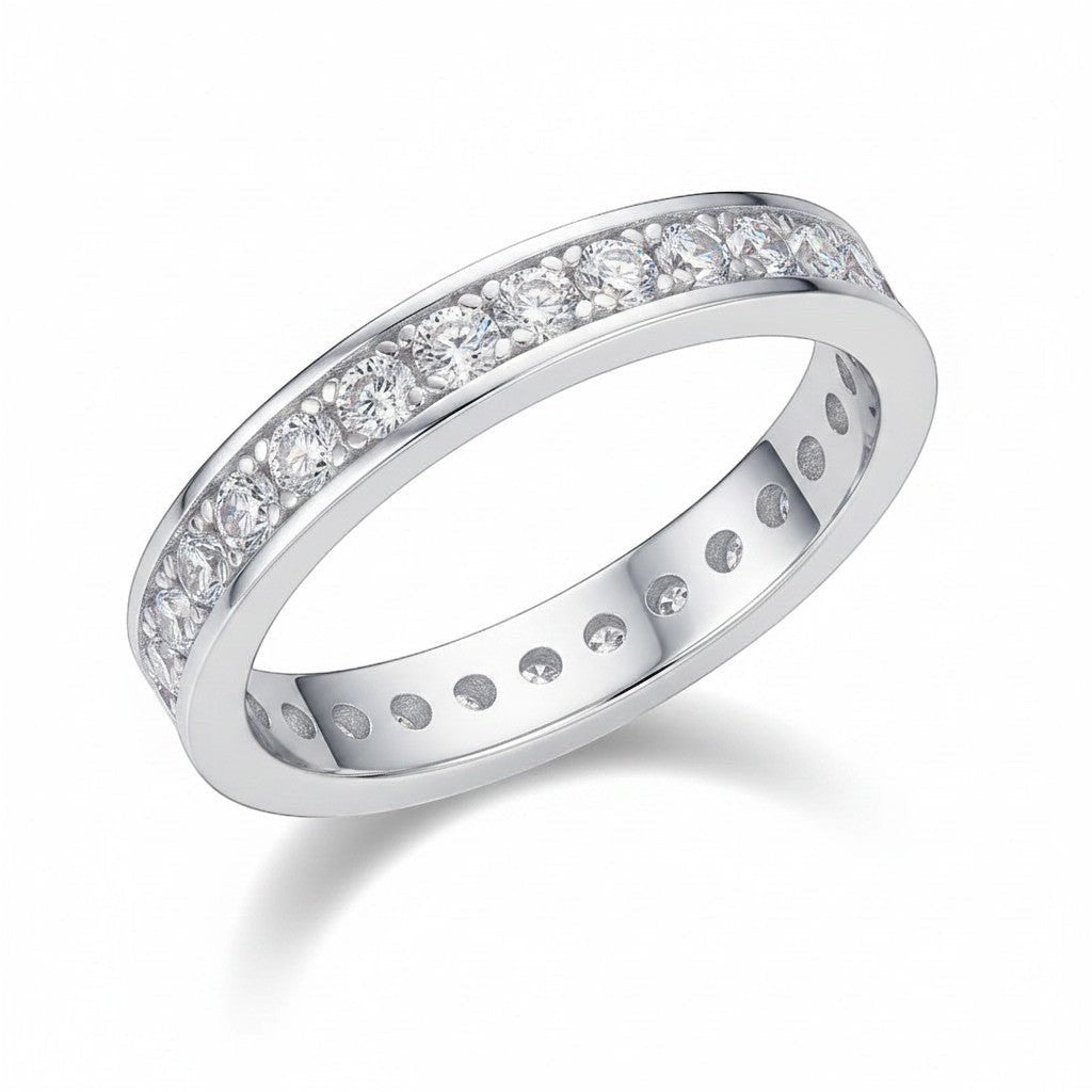 Bee-Bee's classic 2mm moissanite eternity band ring in sterling silver with 18k gold plating. Features D VVS1 clarity stones.