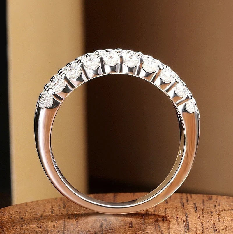 Bee-Bees D Color VVS1 Moissanite triple row half eternity band in S925 sterling silver with 18k white gold plating.