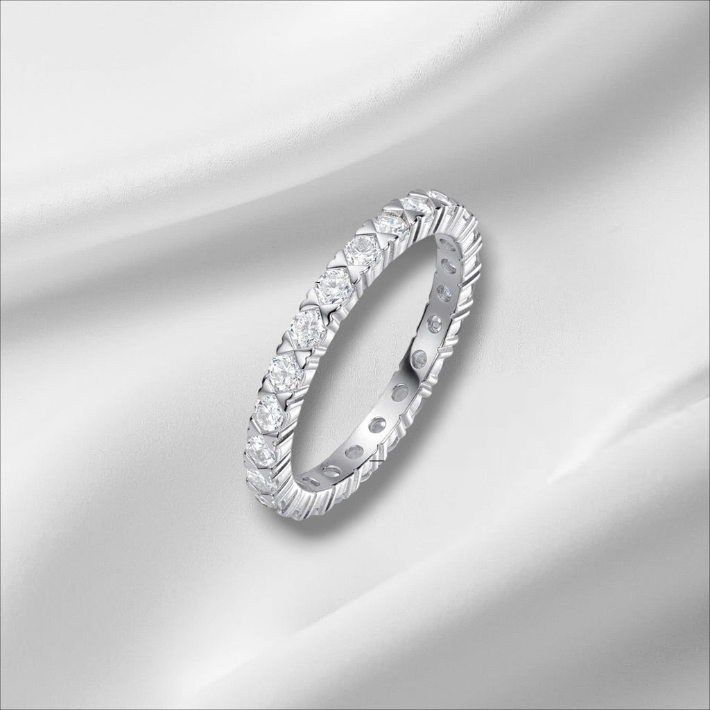 Bee-Bees 2.5mm Moissanite eternity band in s925 sterling silver with 18k gold plating. GRA certified.