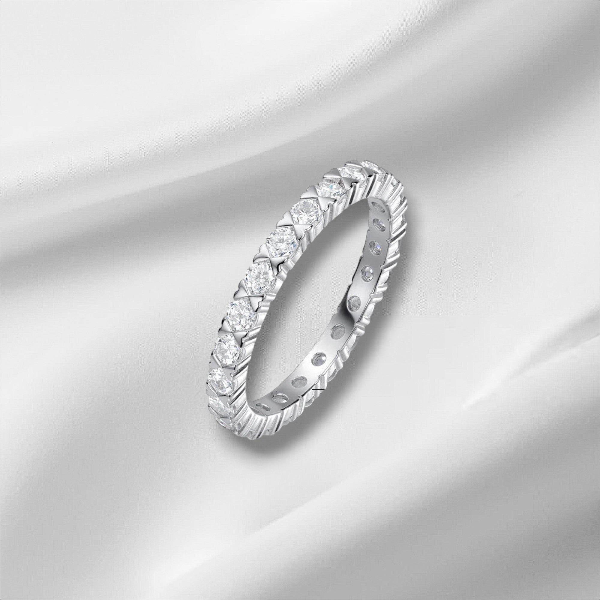 Bee-Bees 2.5mm Moissanite eternity band in s925 sterling silver with 18k gold plating. GRA certified.