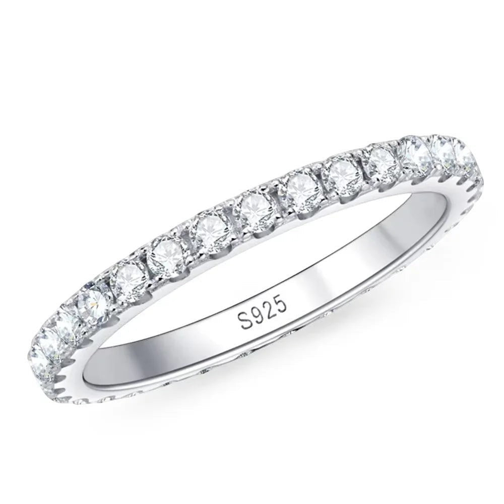 Bee-Bees 2mm D Color Moissanite eternity band in sterling silver with 18k white gold plating. Full circle of sparkling stones.