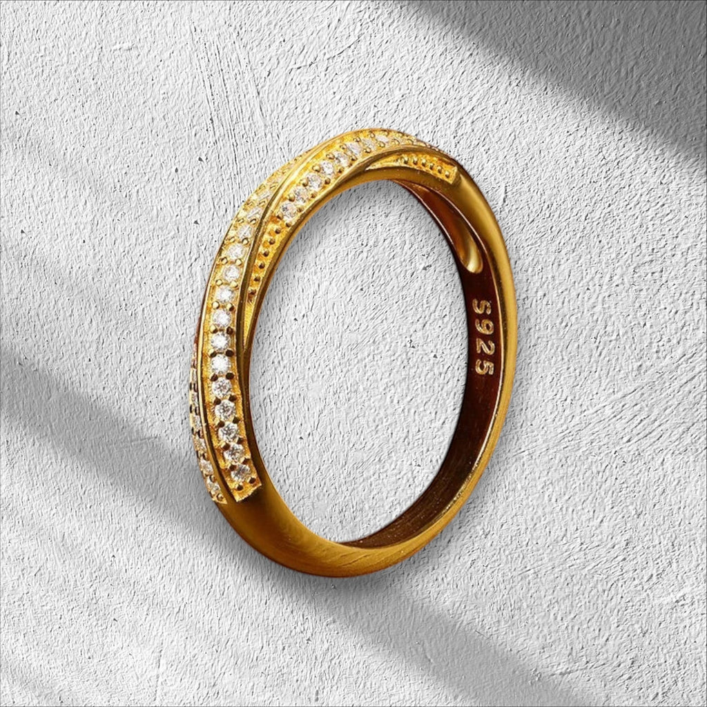 Bee-Bees 1mm moissanite eternity band in 18K white gold plated sterling silver, featuring a double row of sparkling stones.