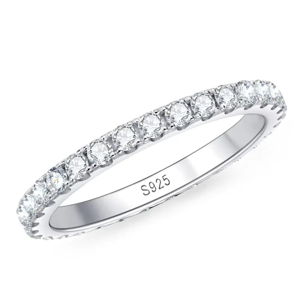 Bee-Bees 2mm D Color Moissanite eternity band in sterling silver with 18k white gold plating. Full circle of sparkling stones.