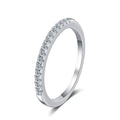 Bee-Bees 2mm D Color Moissanite eternity band in sterling silver with 18k white gold plating. Full circle of small, clear stones.