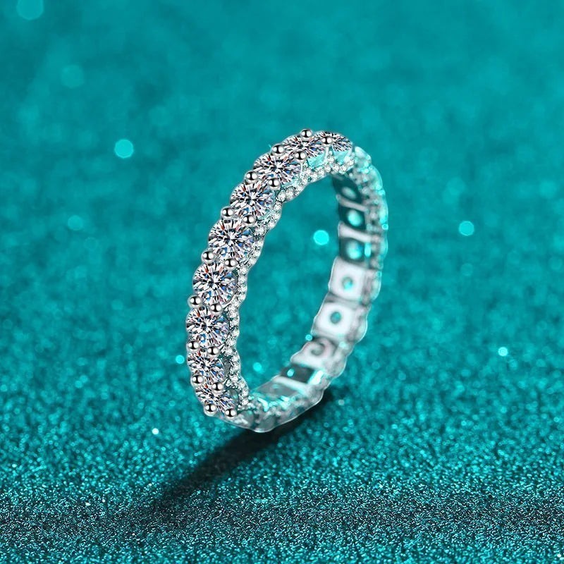 Bee-Bees 2.5ct round moissanite full eternity band in 18k white gold plated sterling silver.
