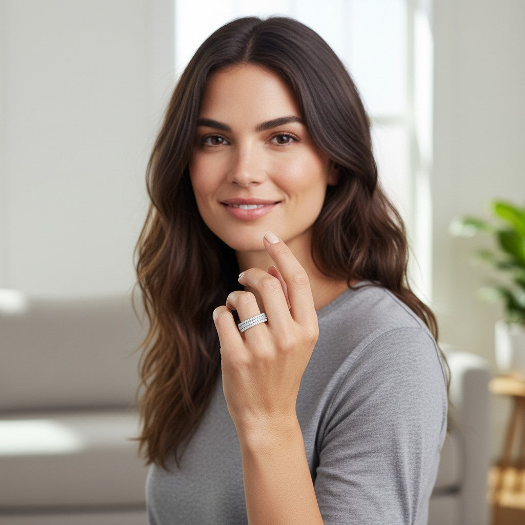 Bee-Bees moissanite eternity band in s925 sterling silver with 18k white gold plating worn by a woman
