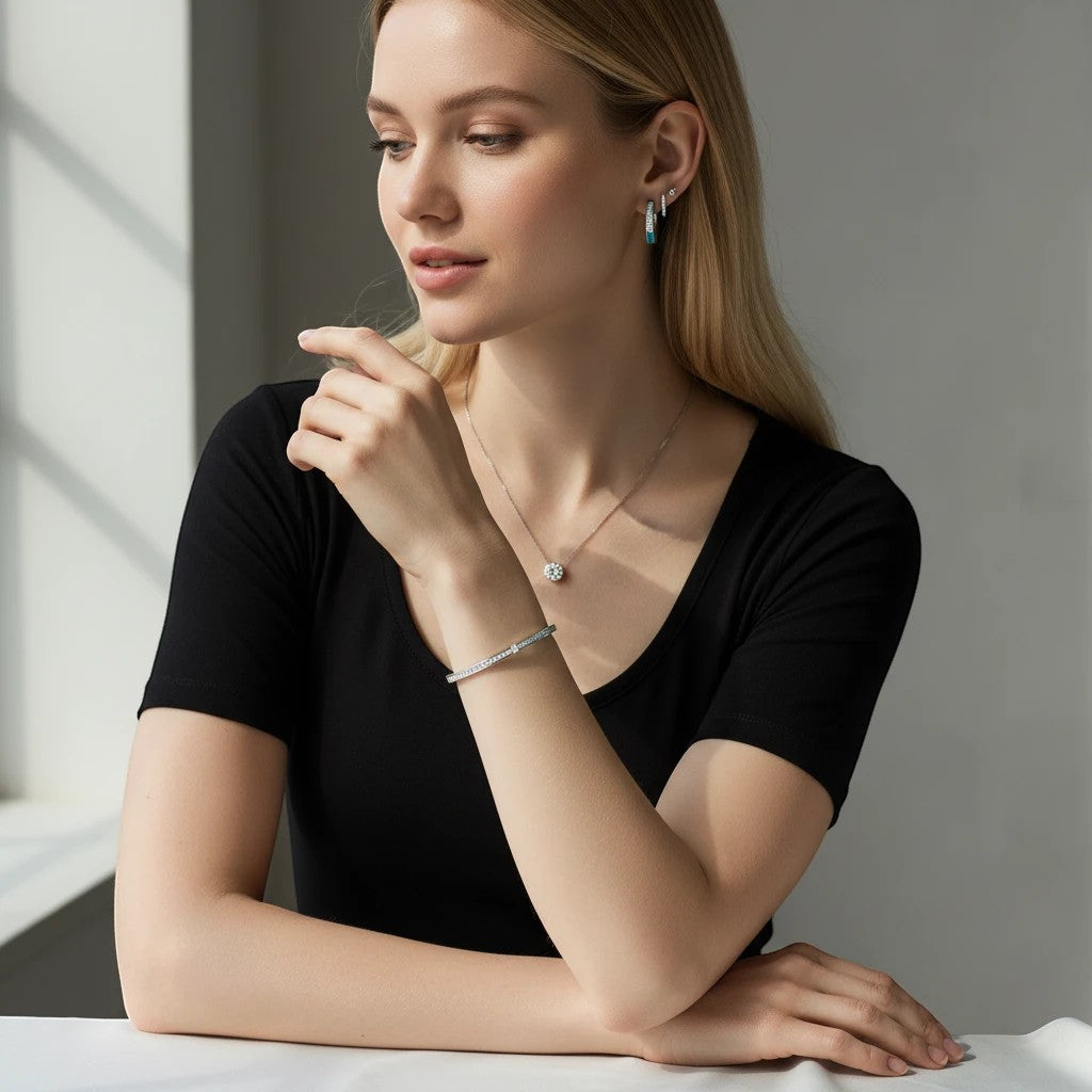 Bee-Bees 2ctw Moissanite eternity bangle in s925 Sterling Silver with 18k white gold plating, featuring D VVS1 stones.