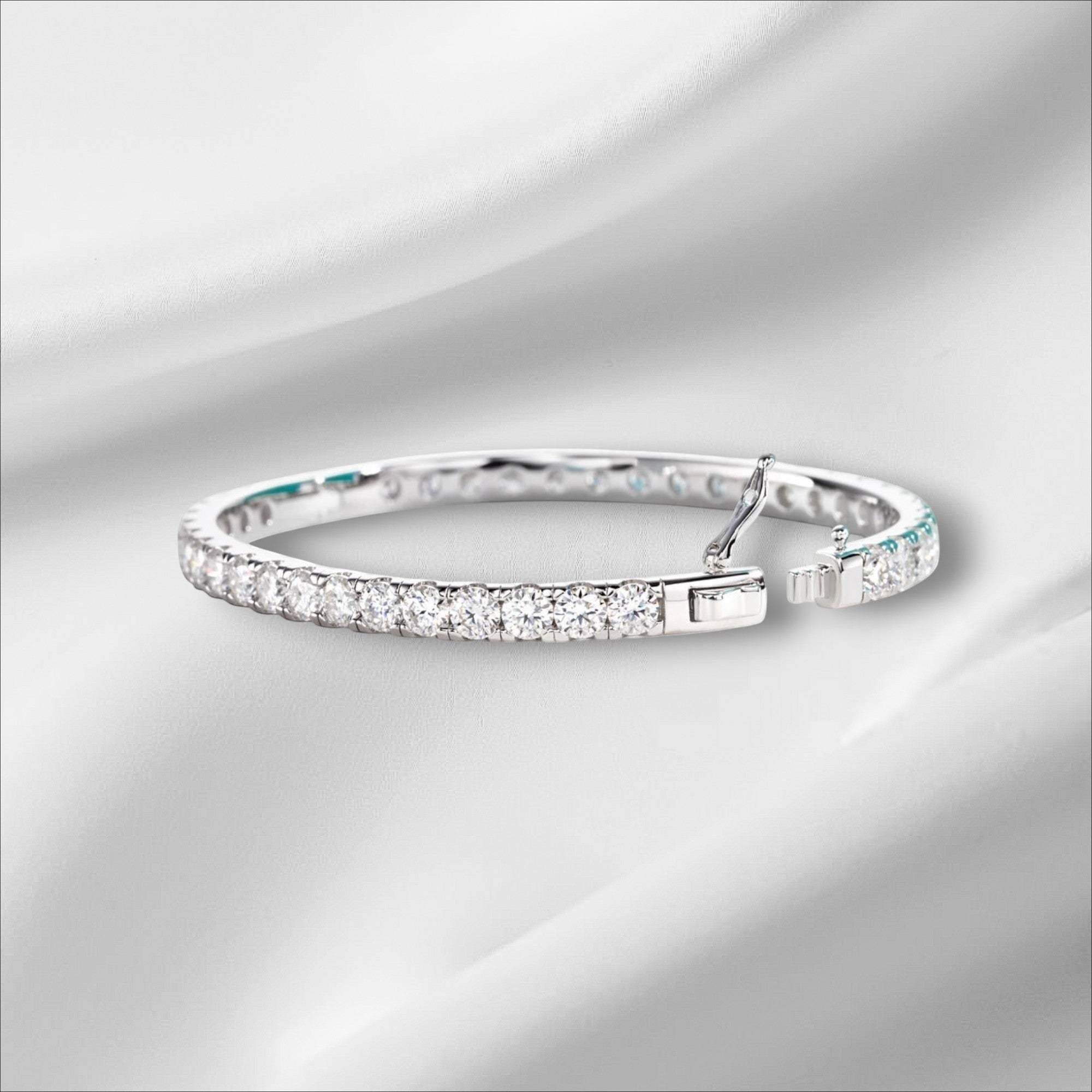 Bee-Bees 11.7ctw Moissanite eternity bangle in sterling silver with 18k white gold plating. Features 4mm round-cut stones and a secure clasp.
