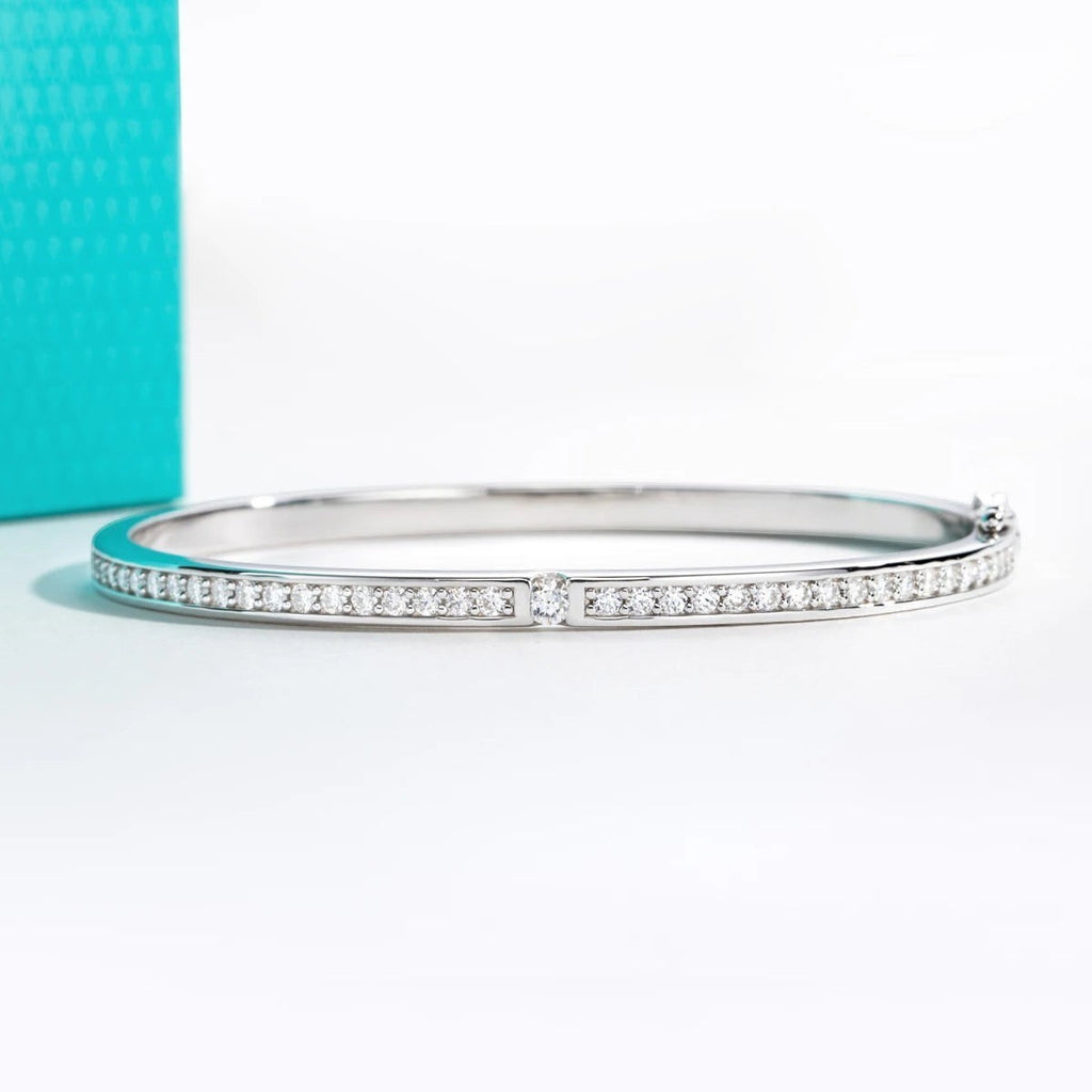 Bee-Bees 2ctw Moissanite eternity bangle in s925 sterling silver with 18k white gold plating. D VVS1 stones.