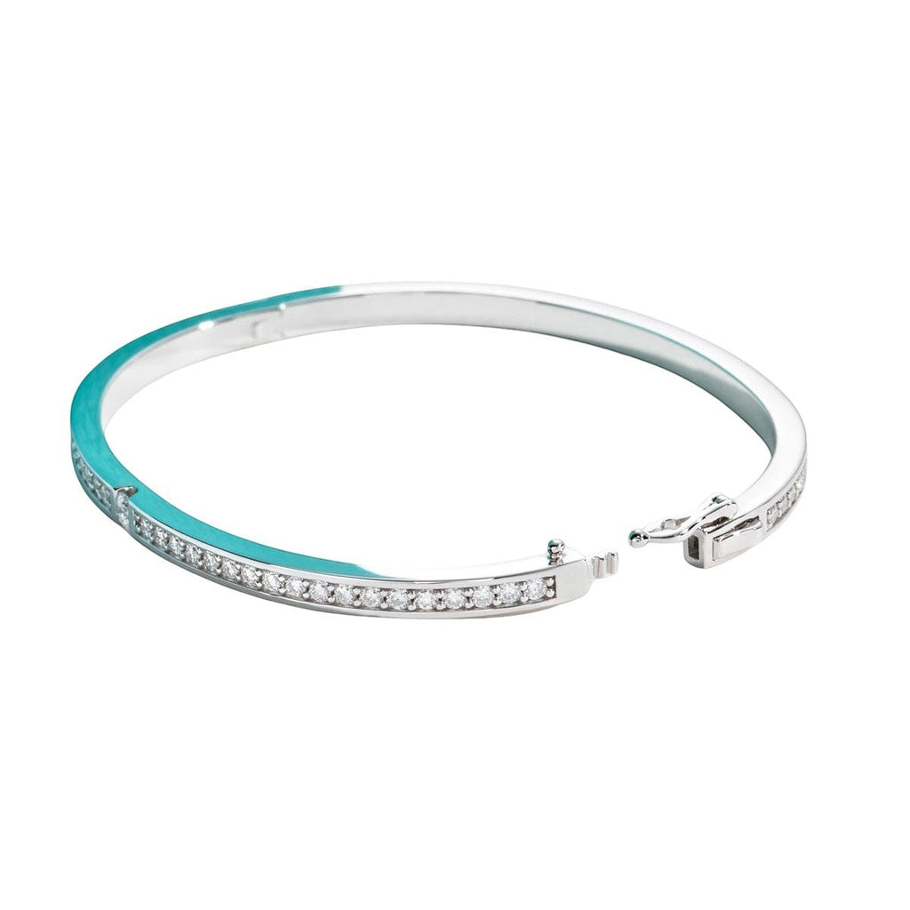 Bee-Bees 2ctw Moissanite eternity bangle in s925 sterling silver with 18k white gold plating. Features D VVS1 stones and a secure clasp.