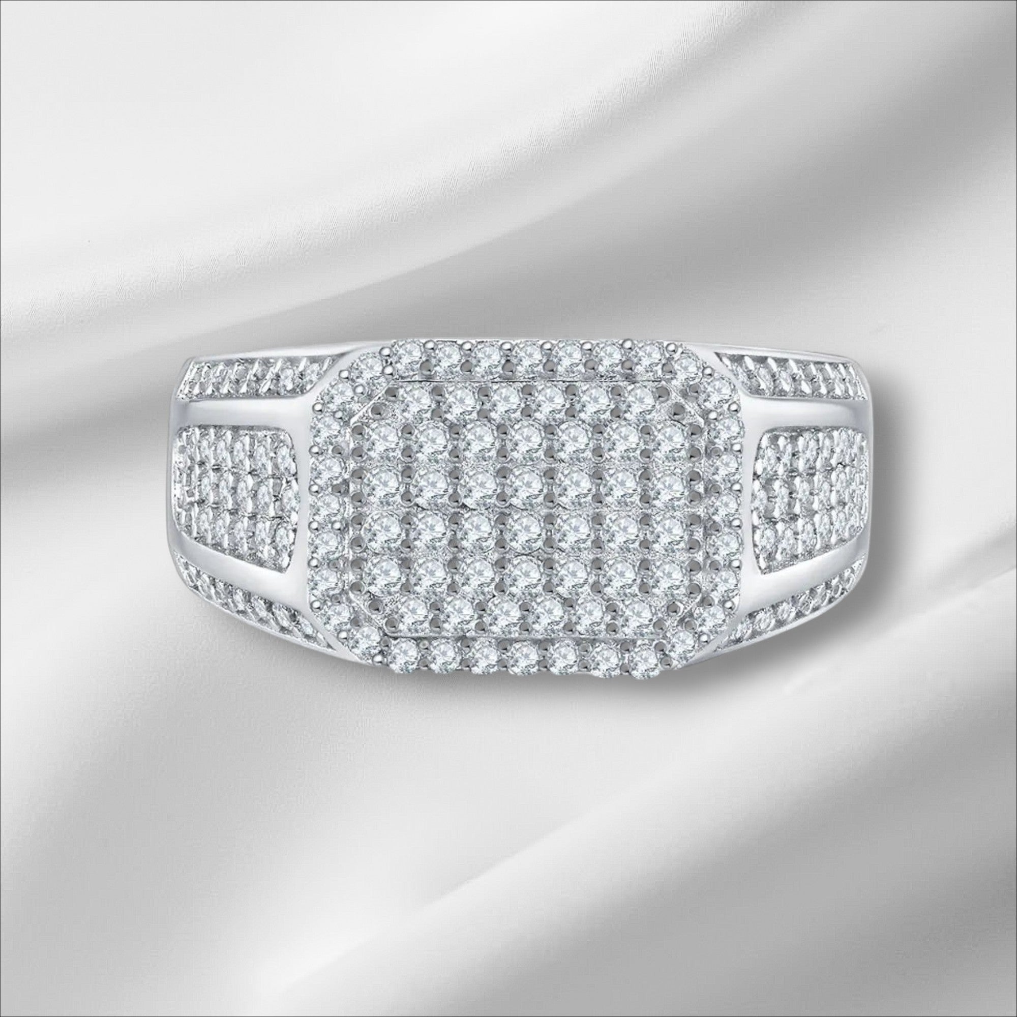 Bee-Bees D VVS Moissanite eternity ring in 925 silver with 18k white gold plating. Features a rectangular cluster of round-cut stones.