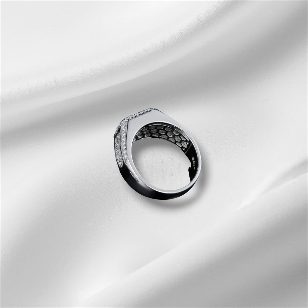 Bee-Bees D VVS Moissanite Eternity Ring in 925 Sterling Silver with 18k White Gold plating. Features small, brilliant stones and a honeycomb interior.