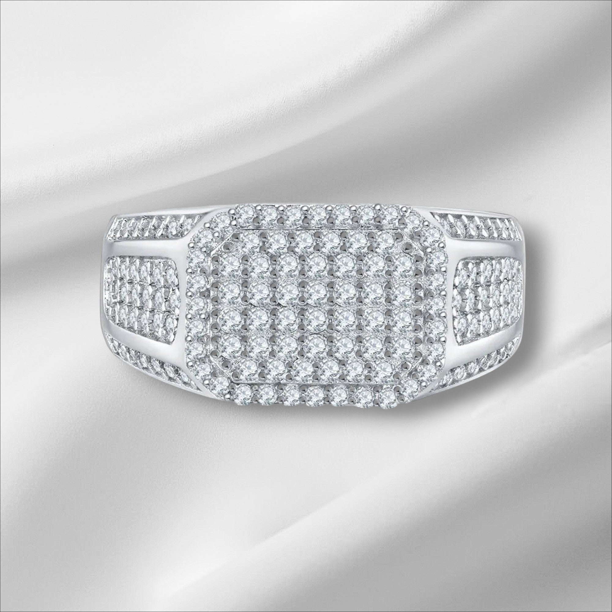 Bee-Bees D VVS Moissanite eternity ring in 925 silver with 18k white gold plating. Features a rectangular cluster of round-cut stones.