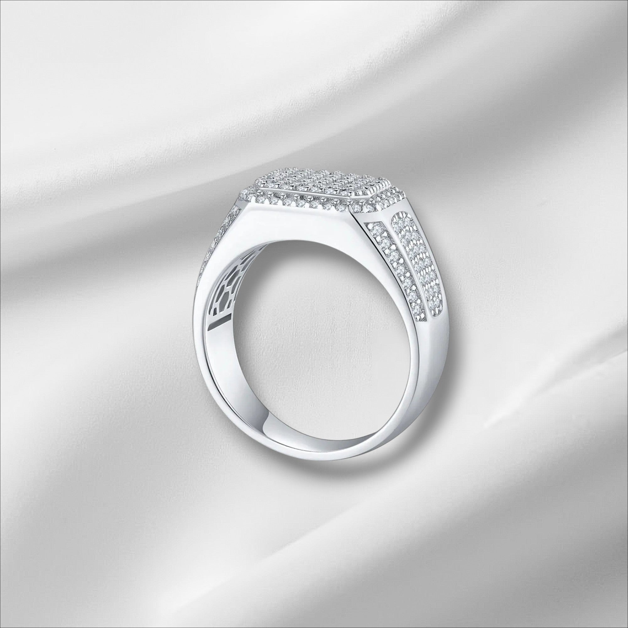 Bee-Bees D VVS Moissanite Eternity Ring in 925 Sterling Silver with 18k White Gold plating. Features a square top paved with small, brilliant-cut stones.