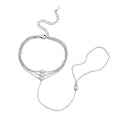 Bee-Bees 3mm moissanite finger bracelet in 925 sterling silver with adjustable chain and three clear stones.