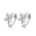 Bee-Bee's 3mm moissanite flower hoop earrings in sterling silver with D color VVS1 stones.