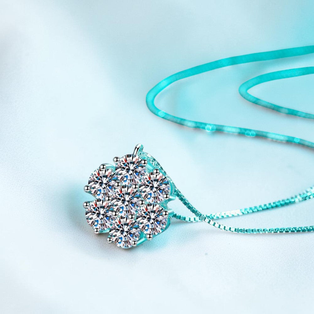 Bee-Bees moissanite flower pendant necklace in 925 sterling silver with 18k white gold plating on a box chain